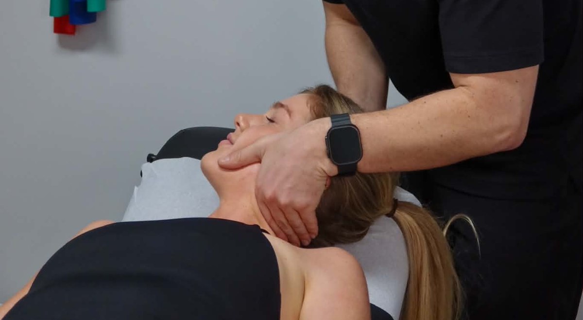 Neck adjustment at BodySync Chiropractic Stirling